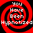 Four identical red and black spiral patterns with white text reading "You Have Been Hypnotized" arranged in a on a solid black background
