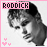 Pixelated grayscale portrait of a person with dark hair, pink border, 'RODDICK' text in pixel font at top, and three pink hearts at bottom left.