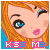 Pixelated cartoon face with orange hair, blue eyes, and pink lips; text 'KISS Me' in pink block letters below.
