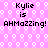 Pixelated text on a pink background with white circular patterns, repeating 'Kylie is AHMAZZING! AHMAZZING!' in four identical sections.