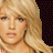 Static 48x48 pixel icon showing a close-up of a person with blonde hair against a dark background, rendered in low-resolution pixel art style.