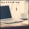 A static image shows a laptop, cup, and microphone on a desk with text reading 'my antidrug' at the top.