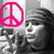 A pixelated image shows a grayscale portrait of a person with long dark hair and a peace symbol in bright pink on the left side.