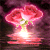 Animated pink flower with green stem and yellow center, emitting light and sparkles against dark background.