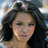 Static pixelated image of a person with long dark hair, light skin tone, and visible facial features including eyes, nose, mouth, and cheeks.