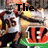 A pixelated image of a football player in a white jersey with number 95, wearing a helmet with a red and black logo, with text overlays reading "The Patriots" and "Rock".