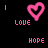 Two pixelated heart icons with 'LOVE' and 'HOPE' text below, one pink on black background, the other white on black background.