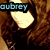 six pixelated images showing a person with long brown hair and a dark top, with text labels and a heart symbol changing across frames