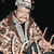 Animated sequence showing a pixelated figure in camouflage attire with text overlays including 'Hunting is for', 'ASSHOLES!', and 'PETA2.COM' against varied backgrounds.