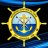 A golden ship's wheel with eight spokes encircles a central emblem showing blue water and white clouds, set against dark background.