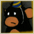 Pixelated cartoon monkey with orange face and ears, black body, blue-yellow striped hat, white eyes, and downturned mouth; text below changes from 'happy' to 'birthday'.