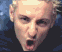 A sequence of five horizontal showing a person with light hair in various facial expressions against a dark blue background