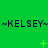 ~KELSEY~ repeated three times horizontally on green background with small plus and X symbols scattered.