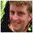 Animated sequence showing a person's face transitioning into 'The Lord of the Rings' text with layered effects and color shifts.