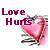 Static pixelated icon featuring bold maroon text "Love Hurts" above a pink heart with green stem and black outline on light pastel background.