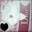 A 48x48 pixel animated buddy icon featuring a white cartoon cat with gray eyes and pink ears, showing two frames where the left frame has a black heart and the right frame has a bright pink heart.
