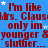 Blue background with red text repeating 'I'm like Mrs. Claus only in younger & slutier...' and white stars scattered throughout.