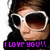 Pixelated image of a person wearing large white-framed sunglasses and a black top with purple text reading "I LOVE YOU!!" at the bottom.