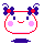 Pixelated cartoon head with white face, red outline, pink cheeks, blue square eyes, red smile, and purple bow with red center on top.