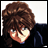 A 48x48 pixel buddy icon split into two frames showing a character with brown hair and glasses on the left, and text reading "Anime IM" above "COM" on the right against black background.