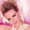 A four- shows a person with styled brown hair and makeup against a pink background, wearing a white sleeveless top with a pearl-like pattern