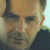 A pixelated image of a person's face on the left and green text reading 'Original Icons .com' on a dark background to the right.