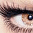 A 4-frame contact sheet of a human eye with animated color-changing irises in brown, green, pink, and teal hues on a gray background.