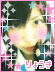 A pixelated portrait with pink border, white lines, and star decorations, featuring a person with dark hair and pink cheeks, with Japanese text at the bottom