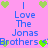Pixelated pink background with blue text reading "I Love The Jonas Brothers" and green heart icons in a repeating pattern.