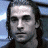 Pixelated image of a person with long hair, wearing dark clothing against a blue-toned background with repeated 'UNDERWORLD' text.
