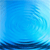A pixelated blue gradient image with darker blue at the bottom transitioning to lighter blue at the top, featuring a faint, abstract curved shape on the right side.