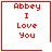 Red pixelated text "Abbey I Love You" in four with one heart and one star symbol on white background