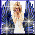 A pixelated image of a person with blonde hair in an updo, wearing sunglasses and a white top against a blue cityscape background.