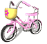 Pink children's bicycle with yellow basket featuring pink flower, black tires, and silver accents on gray background.