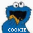 Blue cartoon character with large eyes and open mouth holding a cookie, text below reads 'COOKIE' on left side.