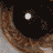 A 3x3 contact sheet of sampled frames from an animated GIF showing close-up facial features and a cigarette, with visible pixelation and dithering effects.