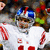 Pixelated image of a football player in white uniform with red stripes and blue helmet, surrounded by text overlays.