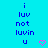 Pixelated blue text on cyan background with pink heart icon, displaying 'i luv not luvin u' in two identical vertical
