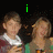Two people stand side-by-side against a dark background with green text above them; the right person's face changes expression across frames.