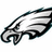 Pixelated eagle head icon with green text phrases about Eagles football victory on light background.