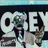 Animated icon shows a character with dark hair and glasses holding a sword, standing before large 'OCEAN' text on two backgrounds.