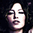 A 2x2 contact sheet of four pixelated frames showing a woman's face in different poses with the text "Coolbuddy.com" on a black background.