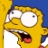 Yellow cartoon character with wide eyes and open mouth against blue and yellow background