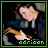 Pixelated icon shows a figure with light skin holding an orange-brown guitar against dark clothing, green border, and text 'adrian' at bottom.