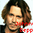 Pixelated image of a person with long brown hair and dark clothing, overlaid with red text fragments on white background.
