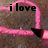 Animated pink neon-style icon with black text and a heart symbol on a textured brown background.