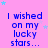 A static image with a pink background displays repeated blue text "I wished on my lucky stars..." surrounded by small light blue and white star shapes.