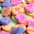 six candy-themed with various sweets including gummy bears, jelly beans, and striped lollipops in bright colors