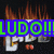 Pixelated text with green letters on blue background, flames above white blocky letters, red dots below.