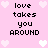 Pixelated pink background with white heart shapes and black text reading "love takes you AROUND" in two identical vertical